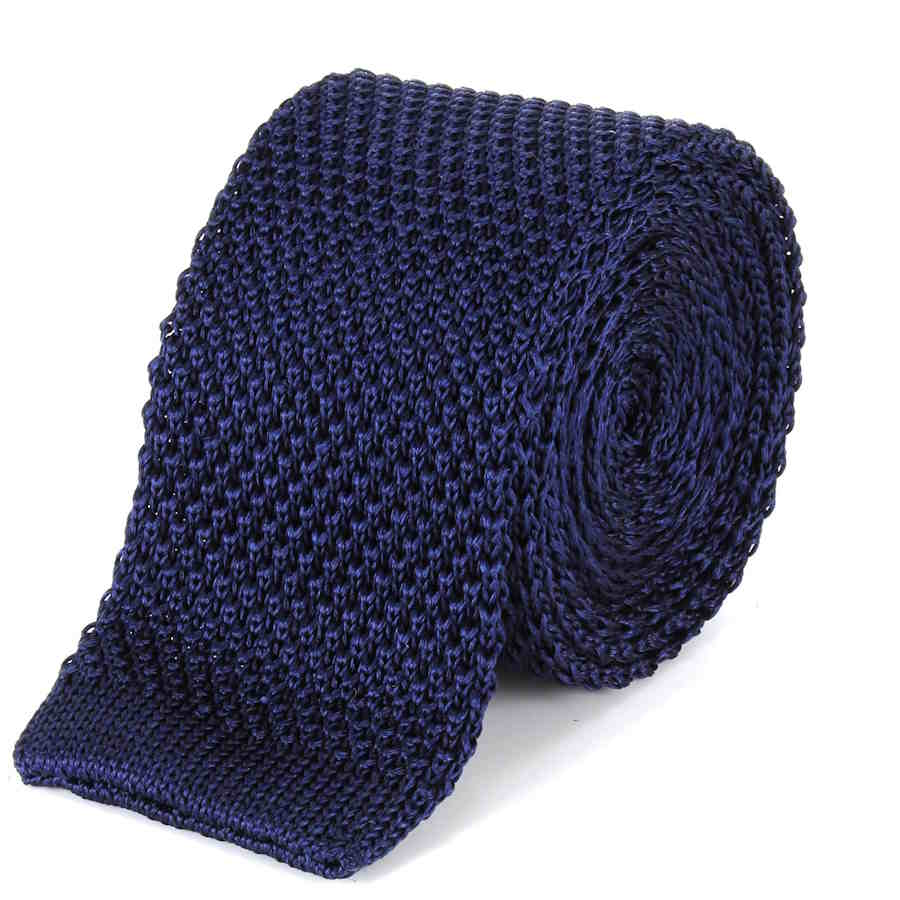 navy blue knitted silk tie rolled up with the straight edge end showing