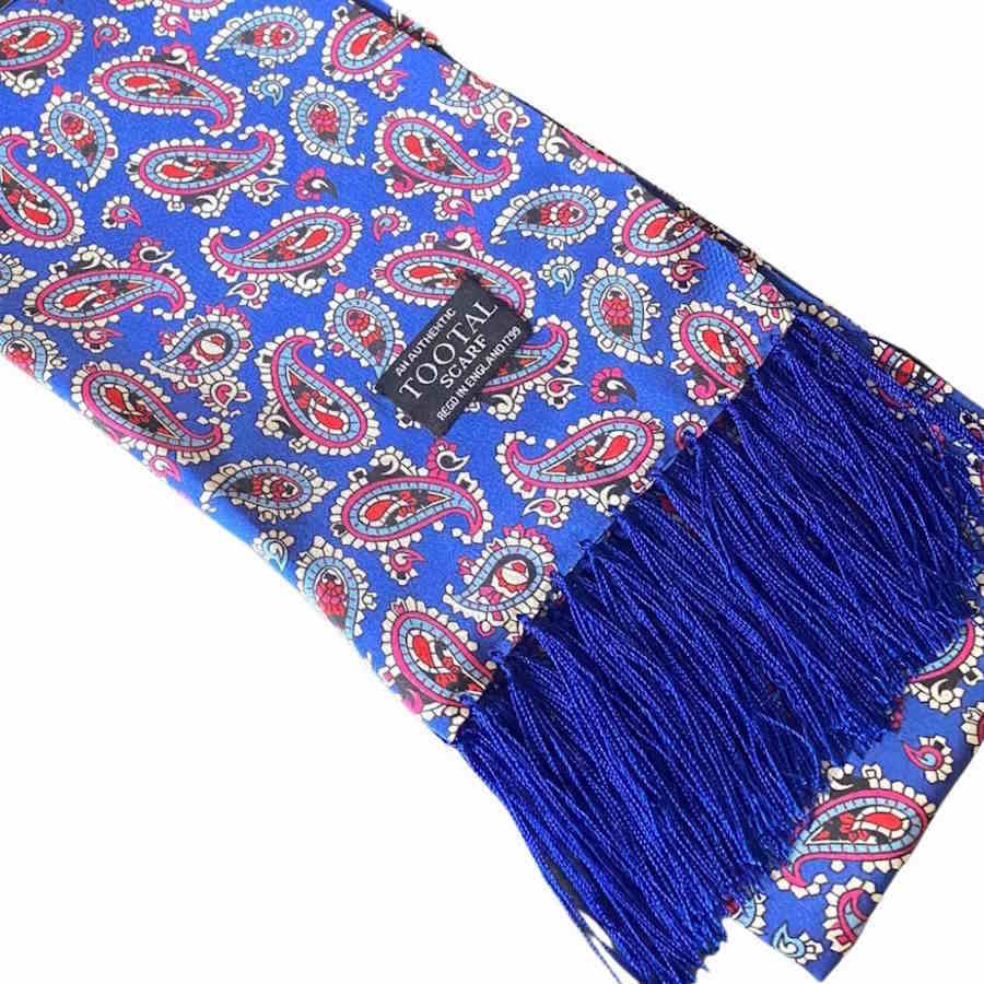 Cobalt blue tootal silk scarf with  paisley print. Blue tassel fringe. 