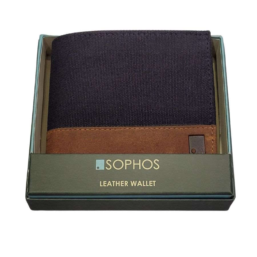 navy waxed canvas wallet with leather trim in cardboard presentation box