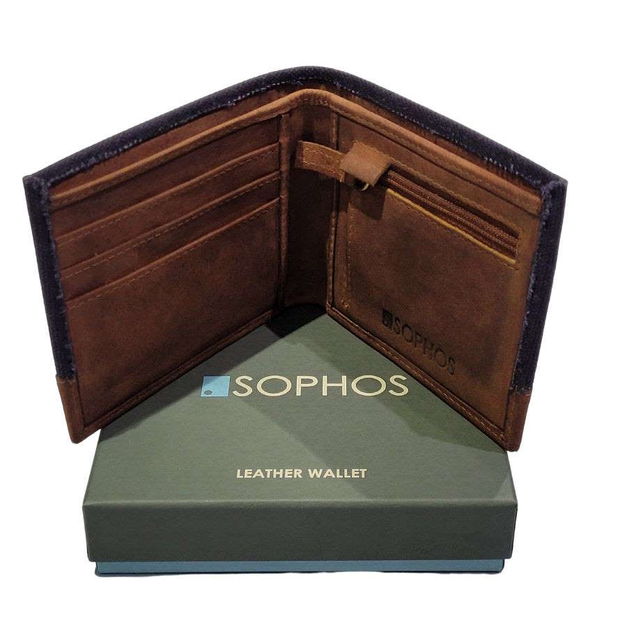 navy waxed canvas wallet with leather trim open stood upright on cardboard presentation box